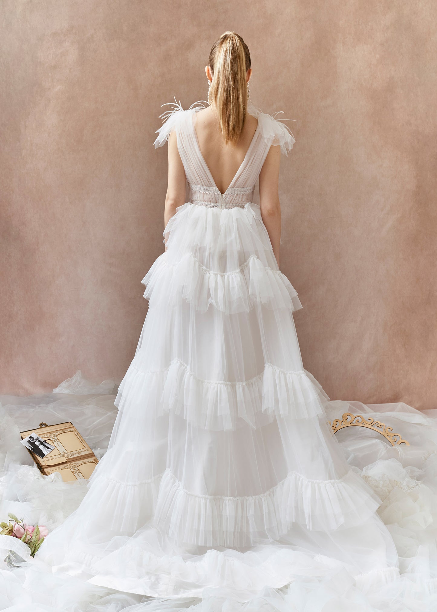 Deep V-Neck Tulle Ball Gown with Cascading Layered Ruffles - Back
