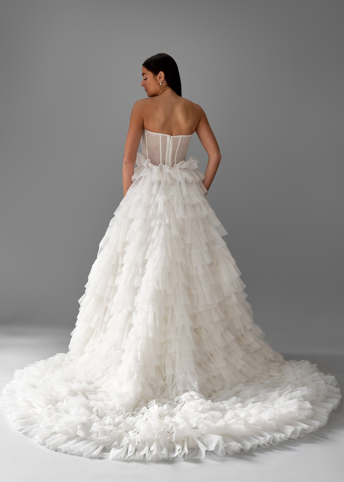 Beaded Corset Gown with Ruffled Skirt and Cathedral Train- Back