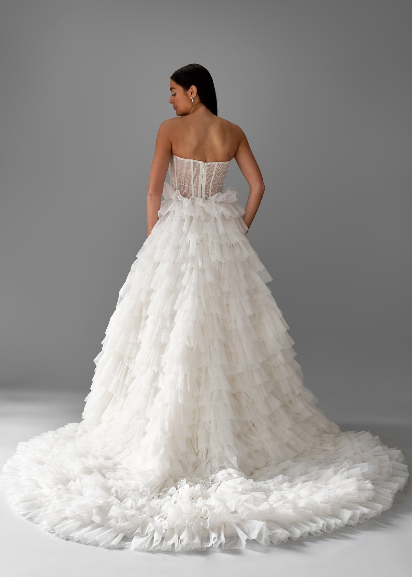 Beaded Corset Gown with Ruffled Skirt and Cathedral Train- Back